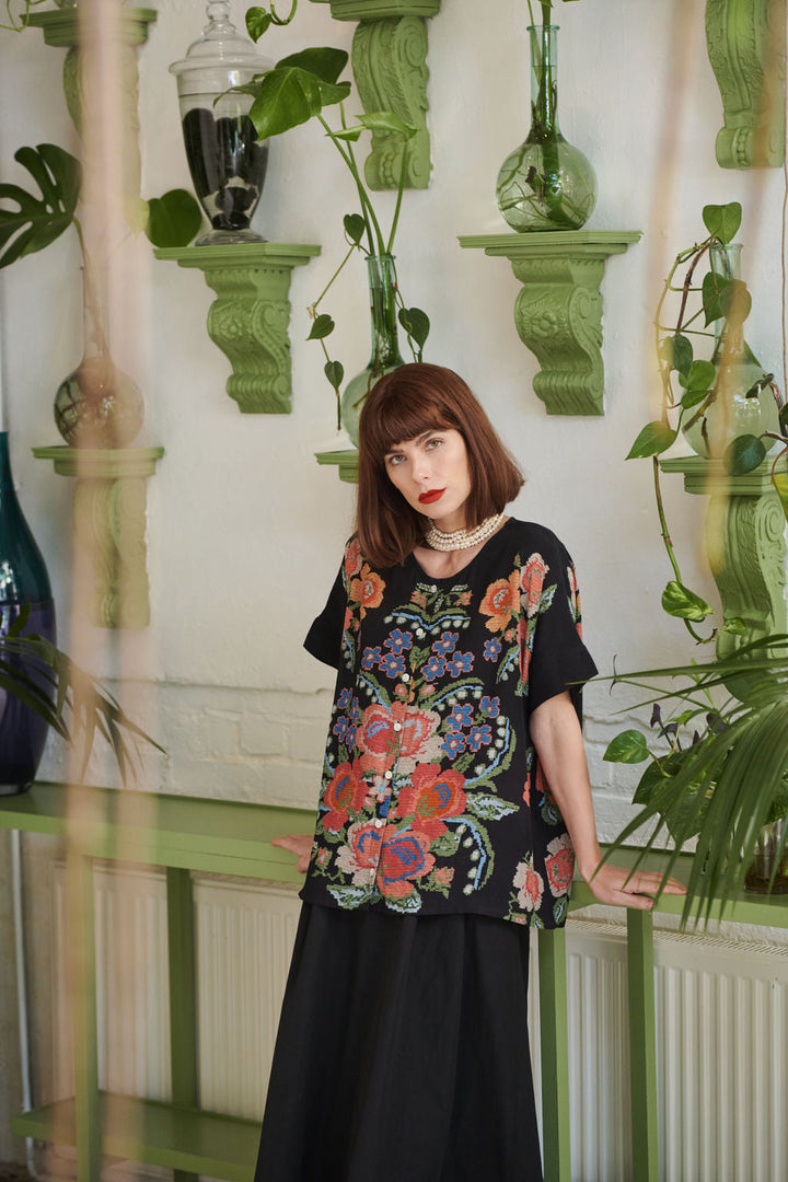 Women's short sleeve button up blouse in black with woven flower print by One Hundred Stars