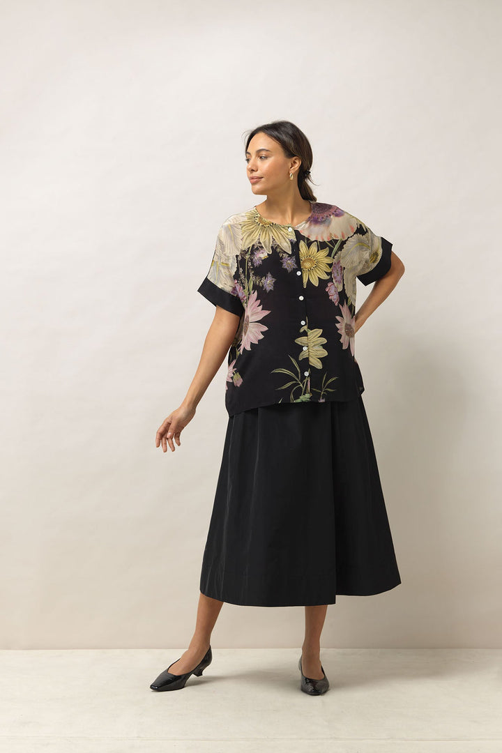 Women's button up short sleeve blouse in black with daisy floral print by One Hundred Stars