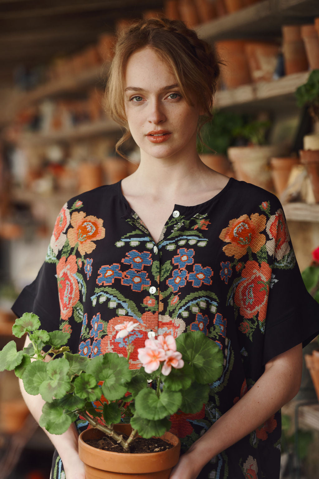 Women's short sleeve button up blouse in black with woven flower print by One Hundred Stars