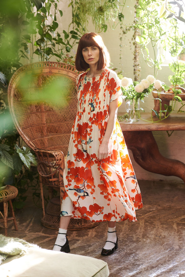 One Hundred Stars Pleated Smock Dress with red acer print 