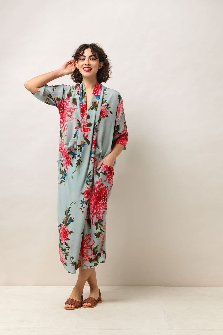 Women's long cowl neck dress with short sleeve in aqua with chrysanthemum print by One Hundred Stars