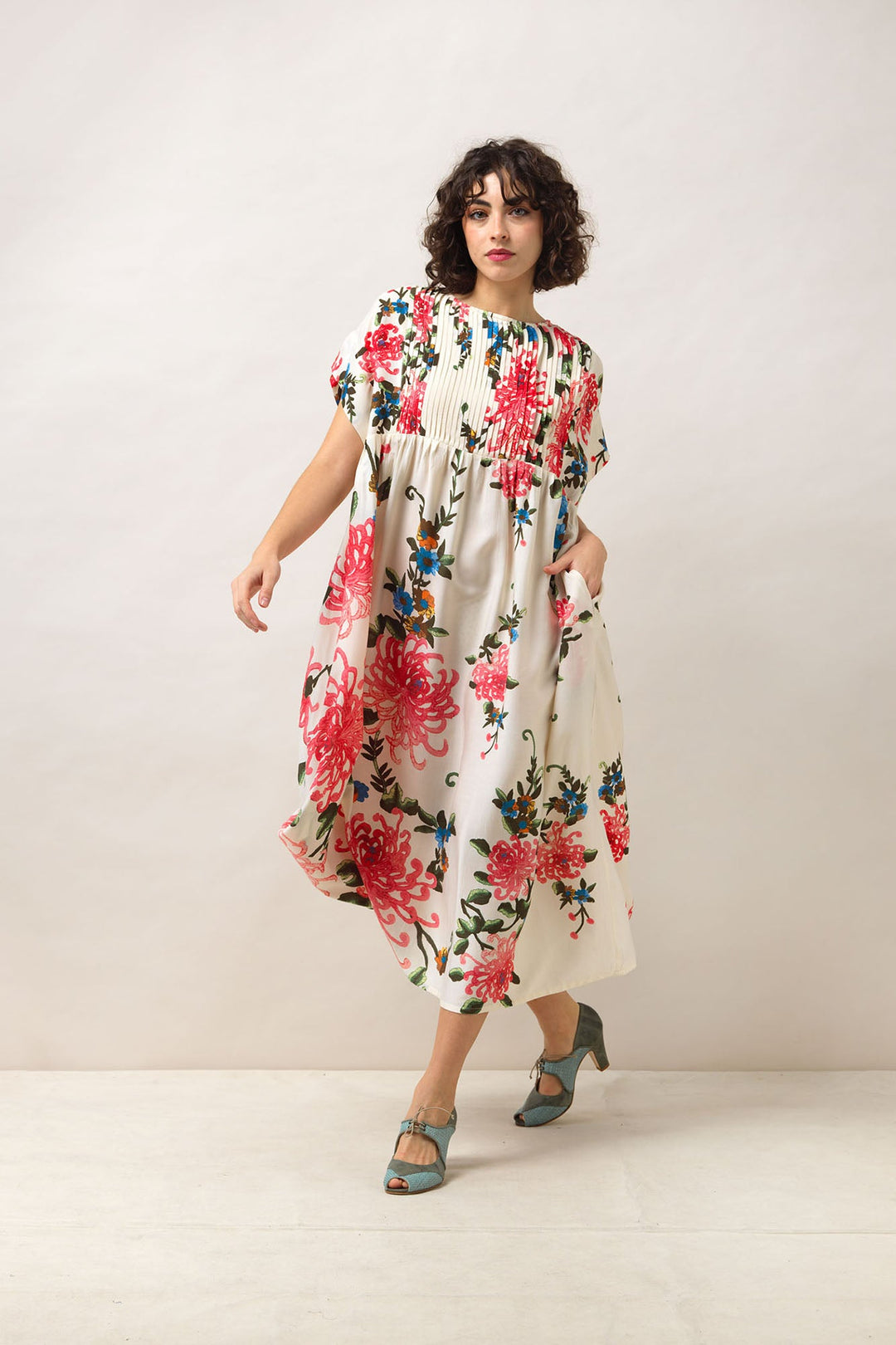 Women's short sleeve pleated dress in ecru with chrysanthemum print by One Hundred Stars