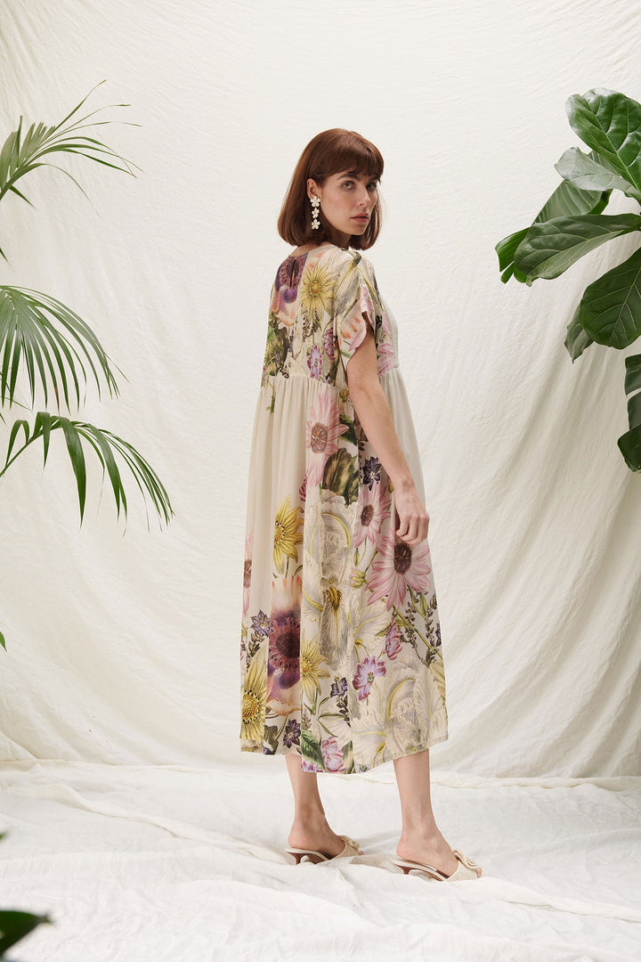 wedding guest dress with floral pastel print by one hundred stars