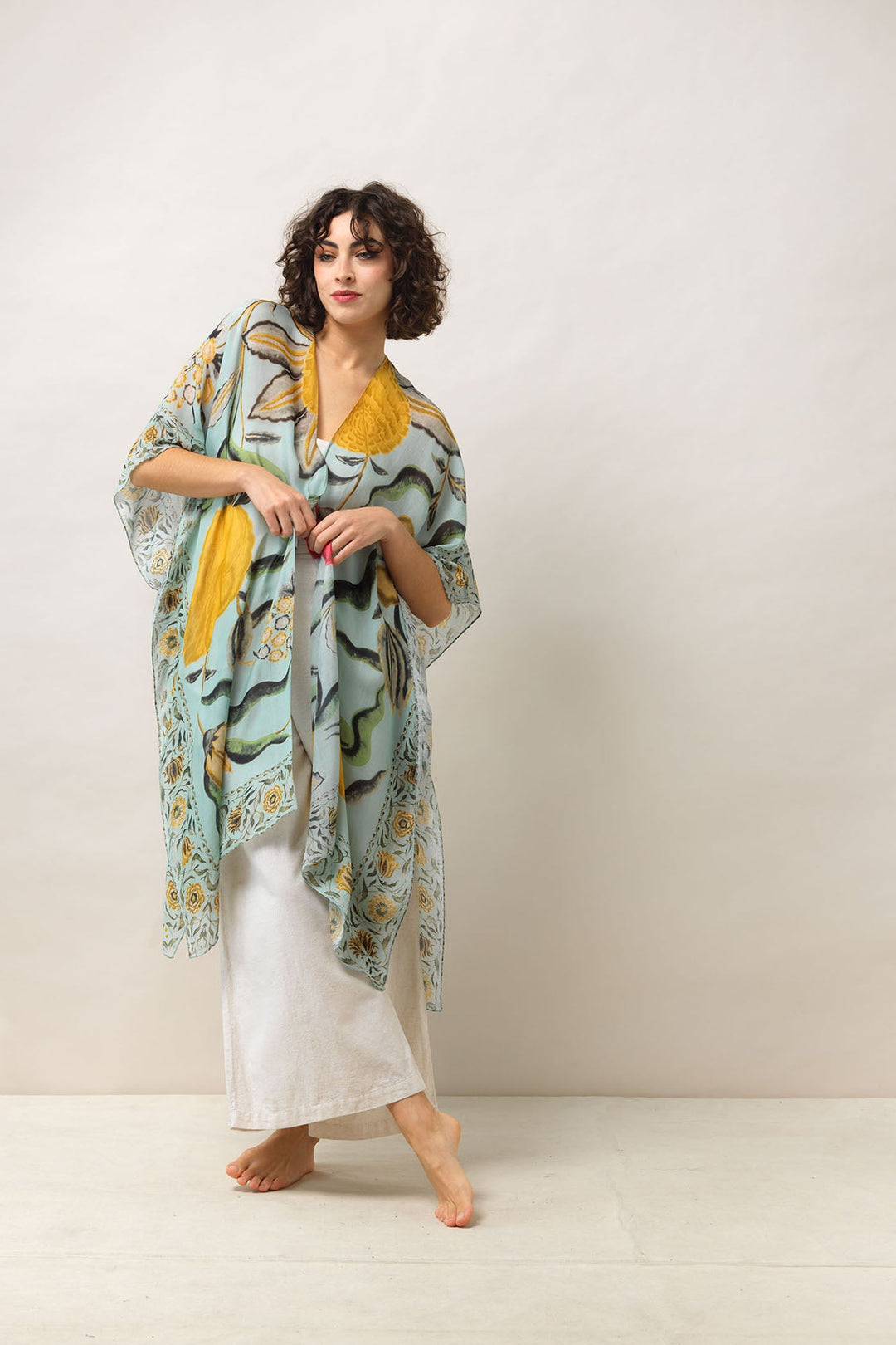 Women's lightweight throwover shawl in aqua with floral joy print by One Hundred Stars