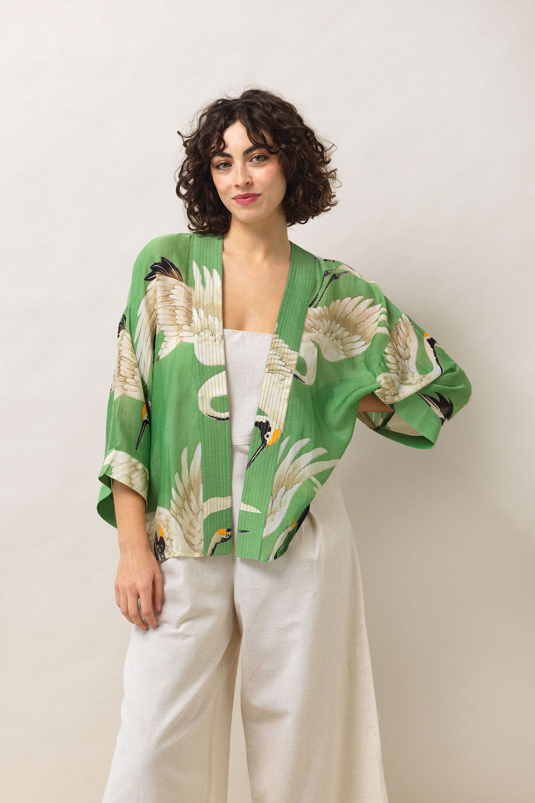 Women's short kimono in pea green and white stork print by One Hundred Stars