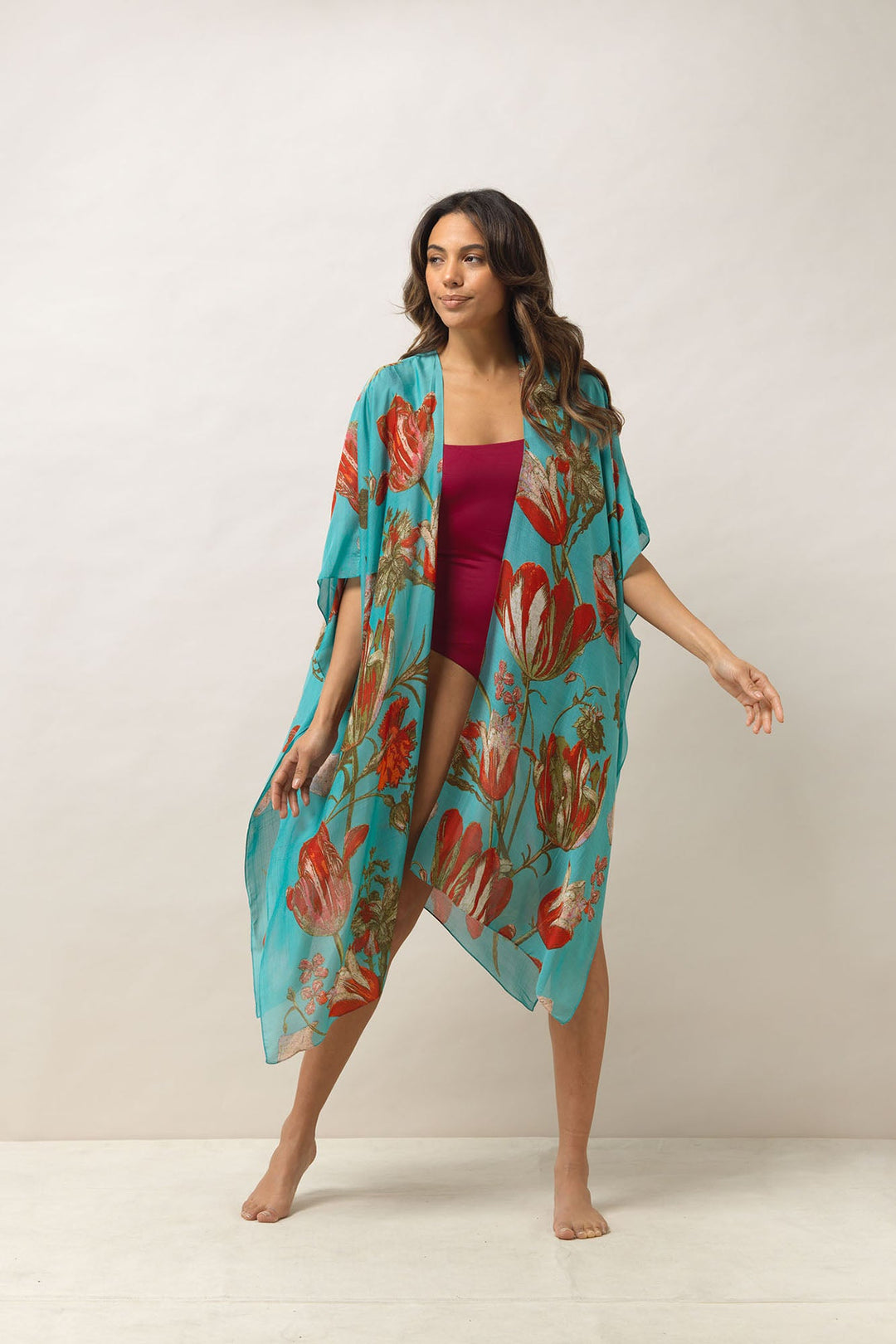 Women's lightweight throwover shawl in blue with tulip floral print by One Hundred Stars