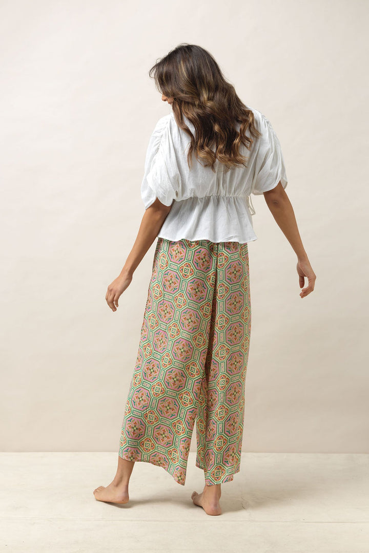 Women's palazzo trouser pants in vintage tiles pink print by One Hundred Stars