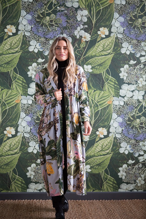 Marianne North Chilli Plant Duster Coat- This stunning shape is both stylish and versatile, whether you choose to wear our duster coat as a luxurious house coat, as part of a chic ensemble during the day or over a little black dress during the evening.