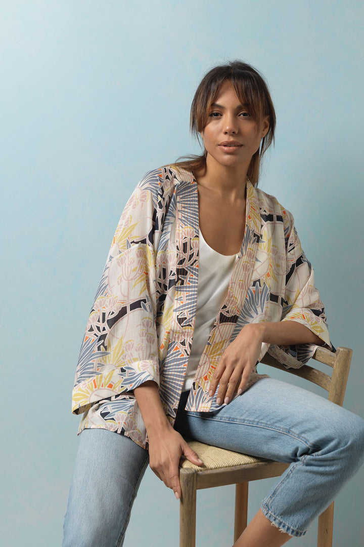 Light weight jacket with wide sleeves, perfect for holidays and covering up on a cool summer evening. 