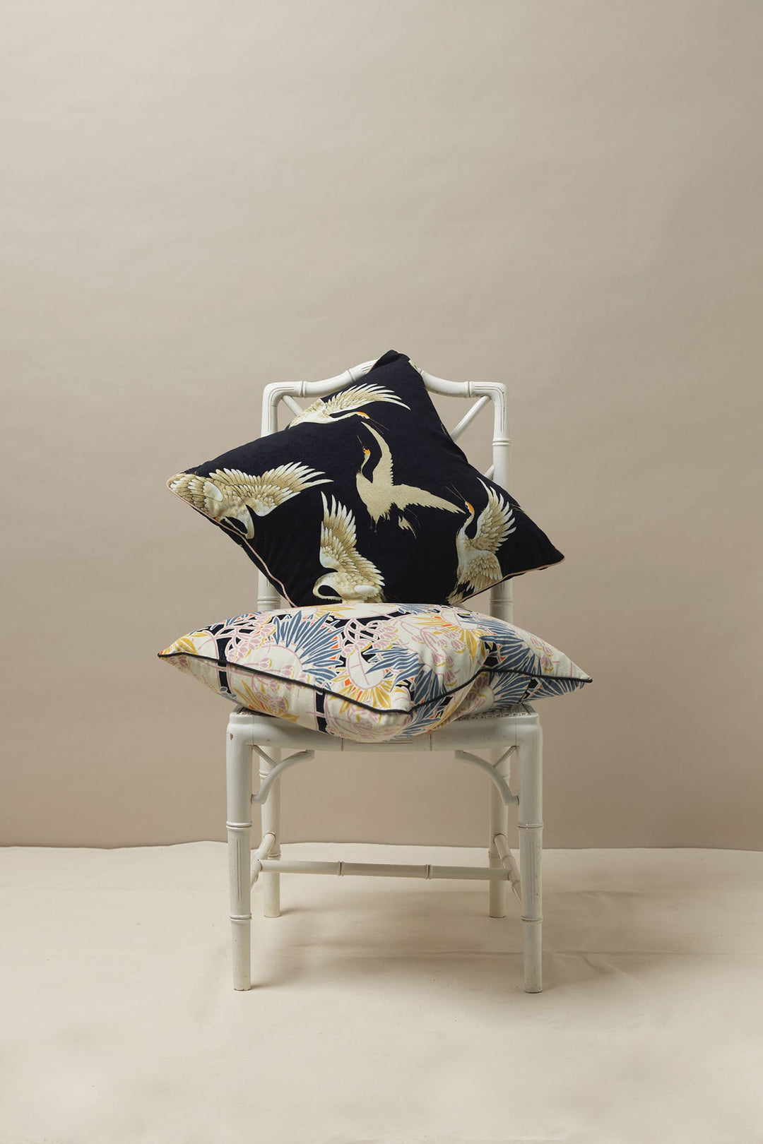 One Hundred Stars - Stork Crane Black Square Velvet Cushion - is perfect for adding a new luxurious print to any room. Picture here with our Deco Daisy cushions, they create the perfect combination of prints. 