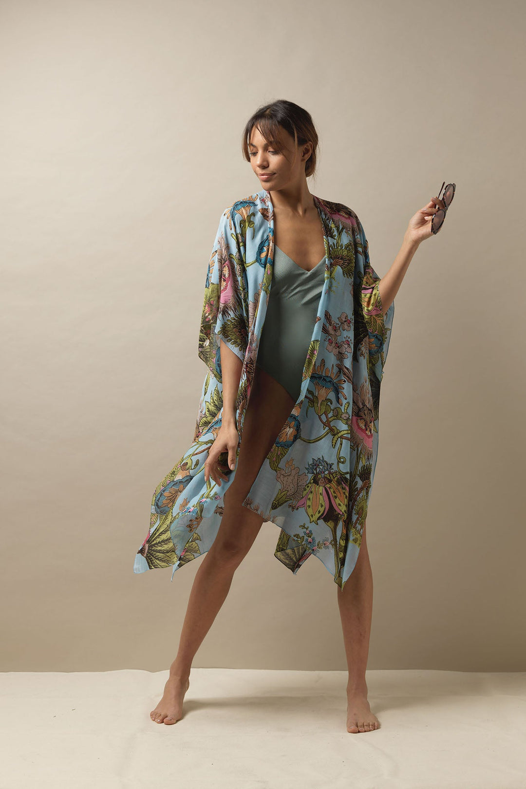 These lightweight throwovers make the perfect poolside cover up, they are mid-length with an open front and loose arms. You can also tie them at the front for a little variation to your look. 