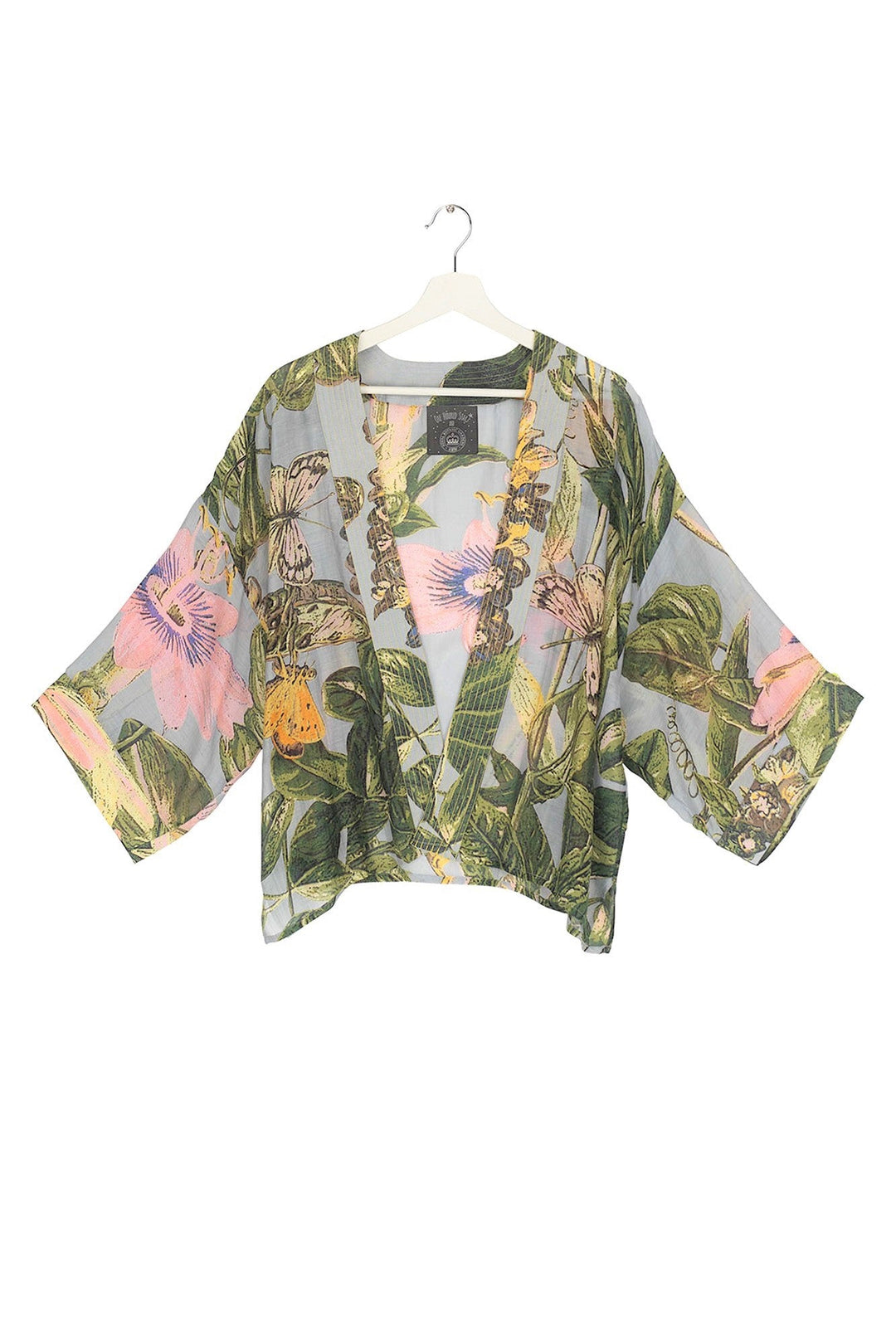 Marianne North Chilli Plant Kimono- Our bestselling kimono jackets have loose ¾ length sleeves, an open front and a lightly embroidered lapel. Pair with a matching camisole and your favourite jeans in summer or layer over a polo neck during the cooler months.