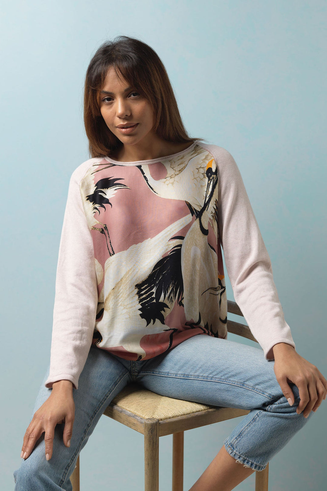Our One Hundred Stars Stork Crane Pastel Pink Jumper is easy to wear this Spring Summer with blue jeans to brighten up your day.