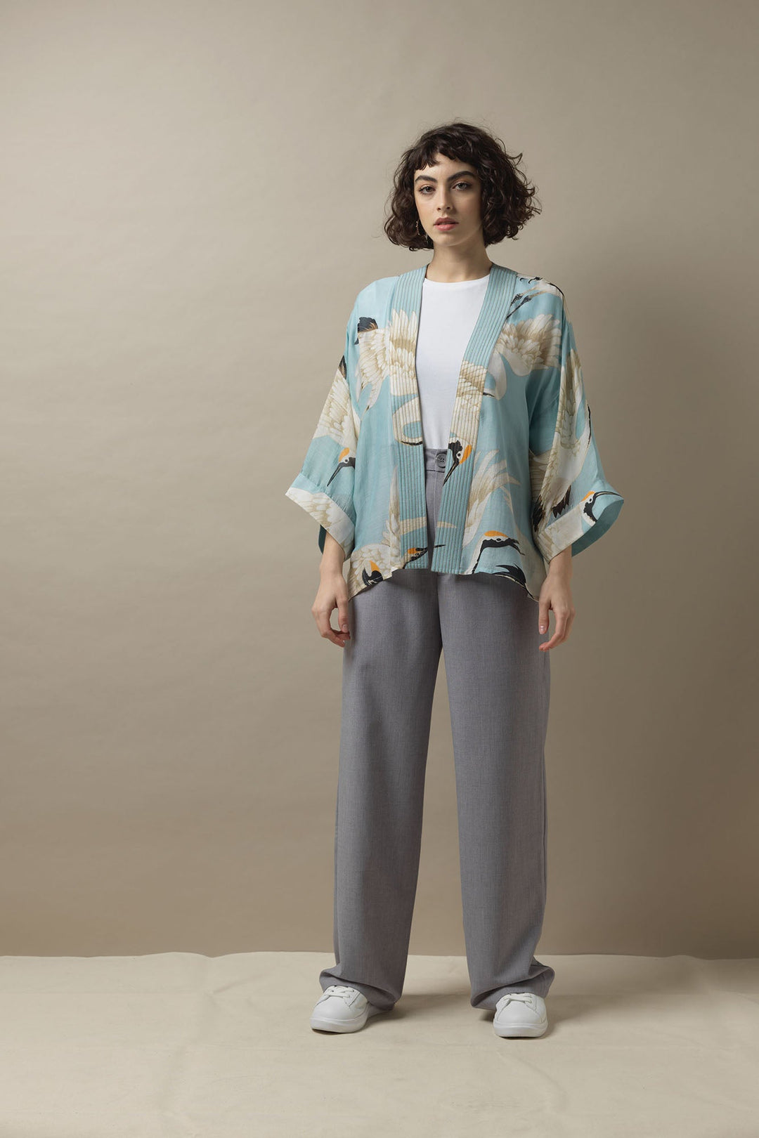One Hundred Stars Stork Crane Sky Blue Short Mini Kimono can be styled with a white t-shirt and grey trousers for a relaxed but chic look. 
